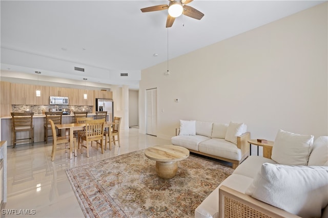 15901 Royal Pointe Ln Unit 404, Fort Myers, FL 33908 - living area featuring light tile patterned floors, a ceiling fan, and visible vents