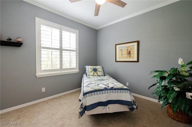 bedroom featuring ornamental molding, carpet flooring, ceiling fan, and baseboards
