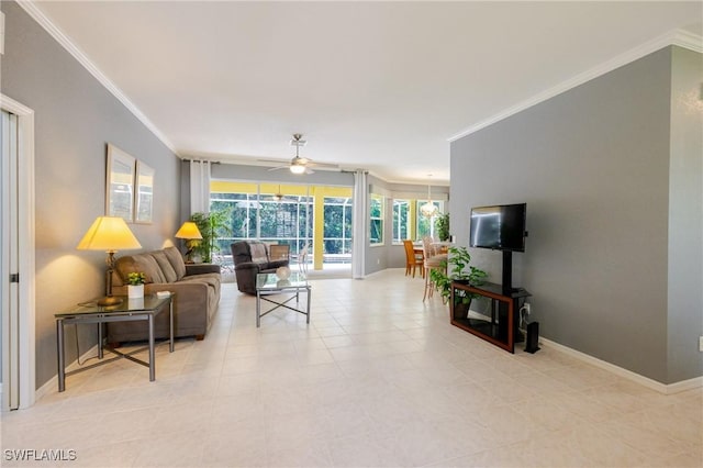 living room featuring ceiling fan, ornamental molding, baseboards, and light tile patterned floors