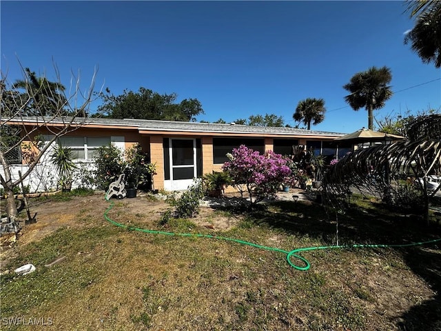 110 Clayton Ave, Lehigh Acres, FL 33936 - view of ranch-style home