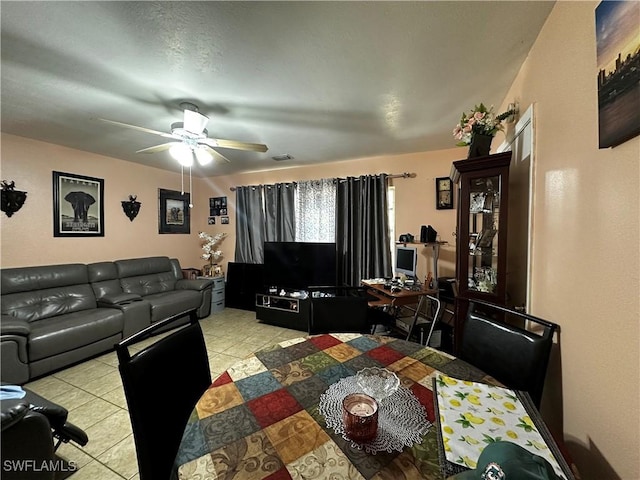 110 Clayton Ave, Lehigh Acres, FL 33936 - dining room featuring light tile patterned floors, a ceiling fan, and visible vents