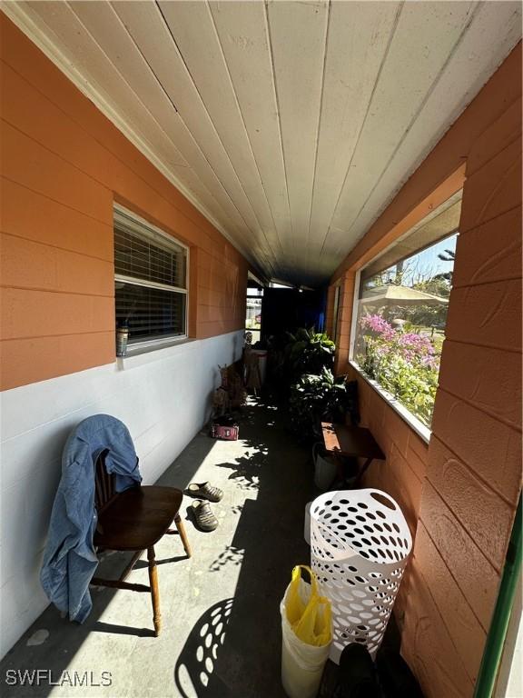 110 Clayton Ave, Lehigh Acres, FL 33936 - view of sunroom / solarium