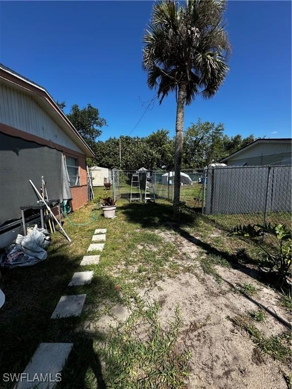 110 Clayton Ave, Lehigh Acres, FL 33936 - view of yard with fence