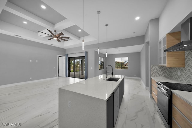 kitchen featuring wall chimney range hood, black electric range, modern cabinets, marble finish floor, and a sink