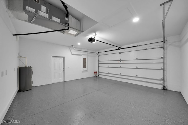 garage with electric panel, water heater, and a garage door opener