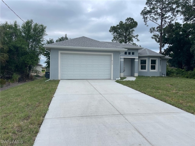 view of front of property featuring a garage, stucco siding, a front lawn, a shingled roof, and driveway