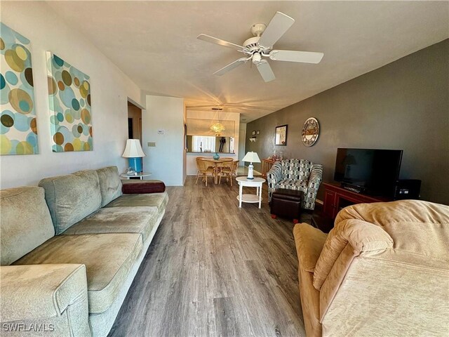11170 Caravel Cir Unit 210, Fort Myers, FL 33908 - living area featuring a ceiling fan and wood finished floors