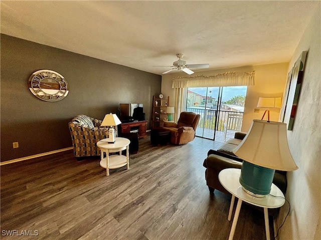 11170 Caravel Cir Unit 210, Fort Myers, FL 33908 - sitting room with baseboards, wood finished floors, and ceiling fan