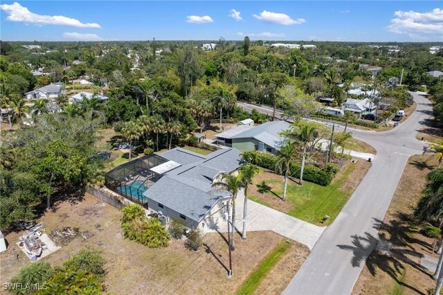 birds eye view of property with a residential view
