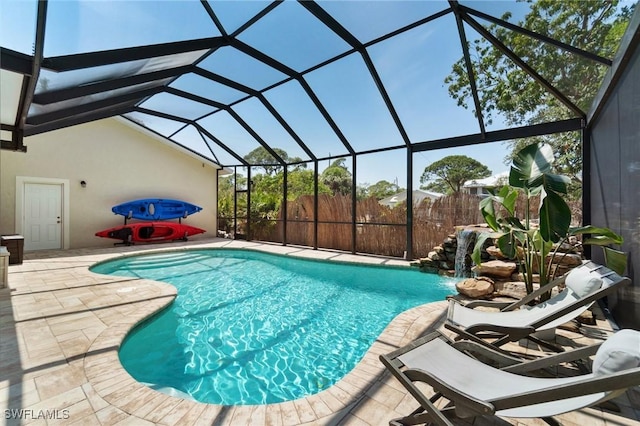view of pool featuring a patio, a lanai, and a fenced in pool