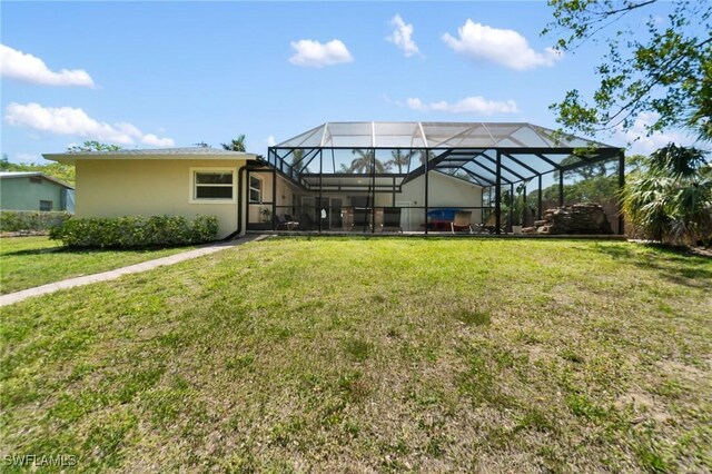 view of yard featuring a lanai