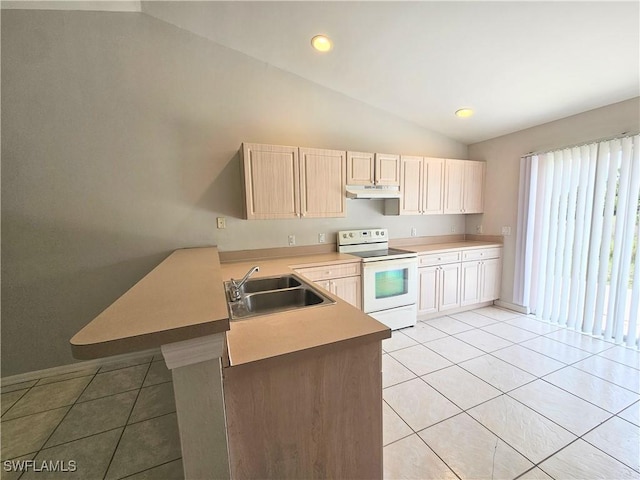 124/126 Ivan Ave S, Lehigh Acres, FL 33973 - kitchen featuring electric range, a sink, under cabinet range hood, a peninsula, and light tile patterned floors