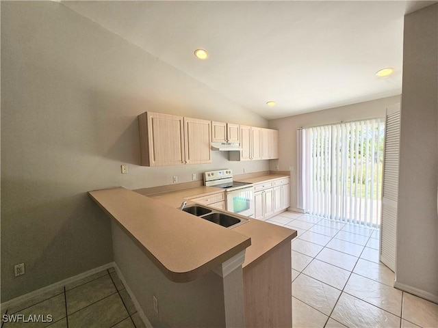 124/126 Ivan Ave S, Lehigh Acres, FL 33973 - kitchen with white electric range oven, a sink, baseboards, vaulted ceiling, and recessed lighting