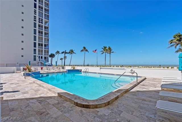 community pool featuring a patio