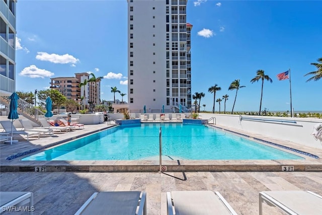 community pool featuring a patio