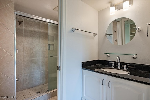 1211 Commonwealth Cir Unit C202, Naples, FL 34116 - bathroom with a shower stall and vanity