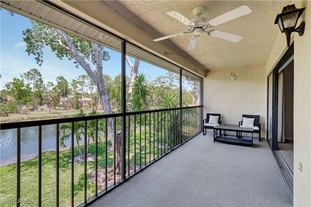 1211 Commonwealth Cir Unit C202, Naples, FL 34116 - sunroom / solarium featuring a water view and a ceiling fan
