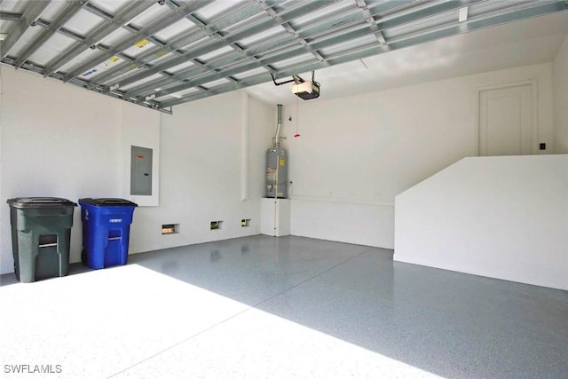 garage with gas water heater, electric panel, and a garage door opener