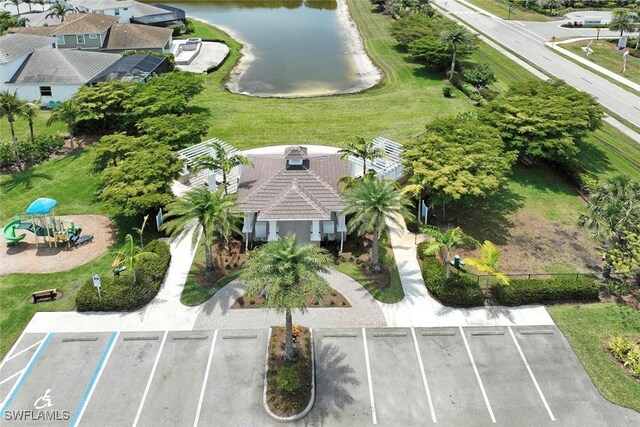 aerial view of property and surrounding area with a large body of water