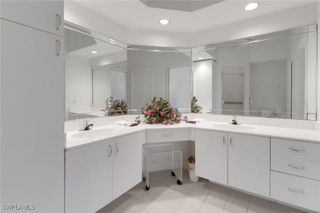 7654 Pebble Creek Cir Unit 5-301, Naples, FL 34108 - full bath with double vanity, a sink, and recessed lighting