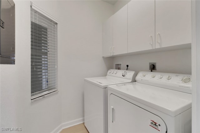 7654 Pebble Creek Cir Unit 5-301, Naples, FL 34108 - laundry room with independent washer and dryer, baseboards, and cabinet space