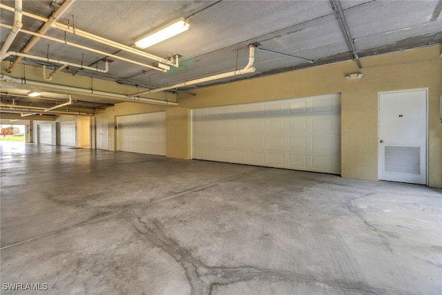 7654 Pebble Creek Cir Unit 5-301, Naples, FL 34108 - view of garage
