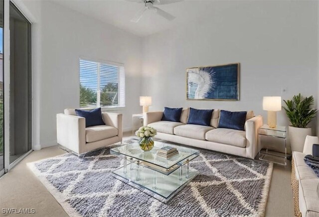 7654 Pebble Creek Cir Unit 5-301, Naples, FL 34108 - living room featuring carpet flooring and ceiling fan