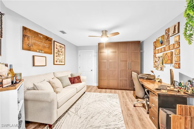 11741 Red Hibiscus Dr, Bonita Springs, FL 34135 - home office with light wood-type flooring, ceiling fan, and visible vents