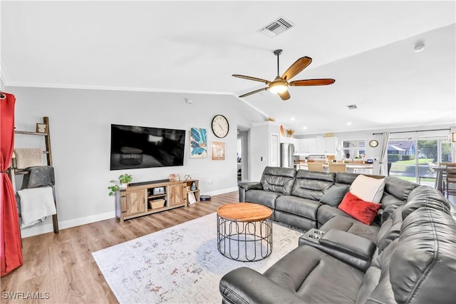 11741 Red Hibiscus Dr, Bonita Springs, FL 34135 - living area featuring light wood-style floors, ceiling fan, visible vents, lofted ceiling, and baseboards
