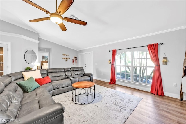 11741 Red Hibiscus Dr, Bonita Springs, FL 34135 - living room with baseboards, a ceiling fan, crown molding, wood finished floors, and lofted ceiling