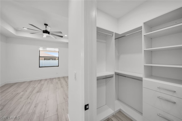 2138 SW 3rd Ave, Cape Coral, FL 33991 - spacious closet featuring a ceiling fan and light wood finished floors