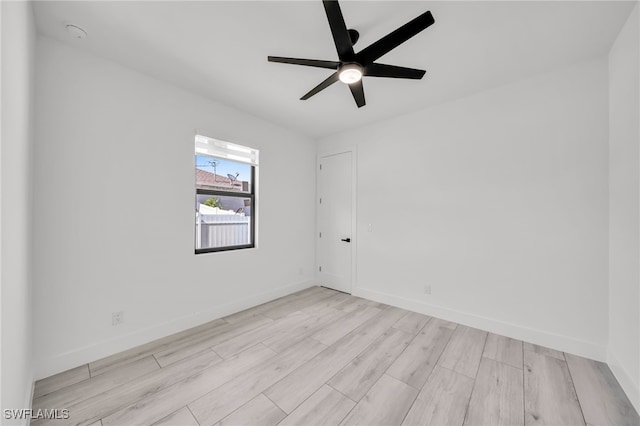 2138 SW 3rd Ave, Cape Coral, FL 33991 - spare room with a ceiling fan and wood finished floors