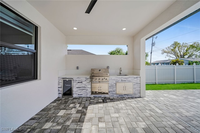 2138 SW 3rd Ave, Cape Coral, FL 33991 - view of patio / terrace featuring exterior kitchen and beverage cooler