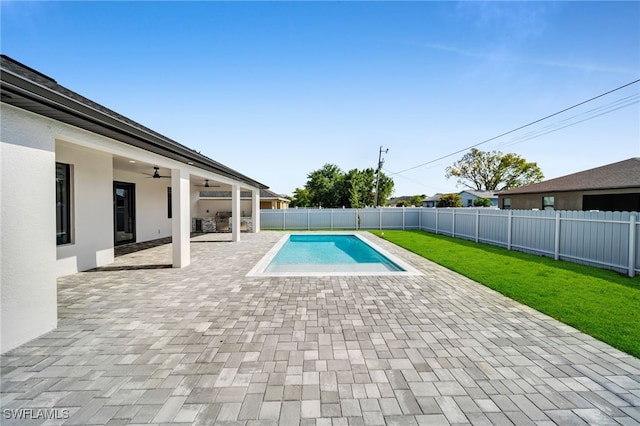2138 SW 3rd Ave, Cape Coral, FL 33991 - view of pool with ceiling fan, a fenced backyard, and a patio