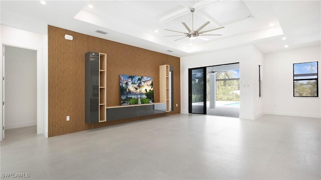 2343 Oil Well Rd, Naples, FL 34120 - empty room featuring an accent wall, ceiling fan, recessed lighting, wood walls, and coffered ceiling