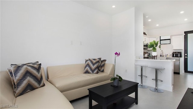 2343 Oil Well Rd, Naples, FL 34120 - living room with concrete floors and recessed lighting