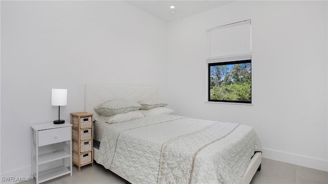 2343 Oil Well Rd, Naples, FL 34120 - tiled bedroom with recessed lighting and baseboards