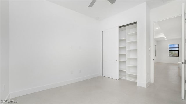 2343 Oil Well Rd, Naples, FL 34120 - unfurnished bedroom featuring a closet, baseboards, recessed lighting, a ceiling fan, and concrete flooring