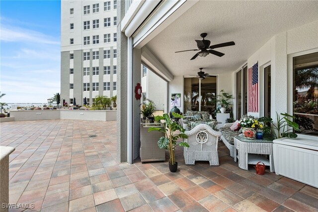 14270 Royal Harbour Ct Unit 323, Fort Myers, FL 33908 - view of patio featuring ceiling fan
