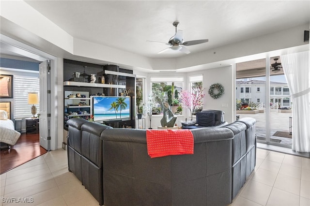 14270 Royal Harbour Ct Unit 323, Fort Myers, FL 33908 - living area featuring ceiling fan and light tile patterned flooring