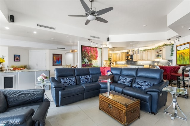 14270 Royal Harbour Ct Unit 323, Fort Myers, FL 33908 - living room with light tile patterned floors, ceiling fan, recessed lighting, and a raised ceiling