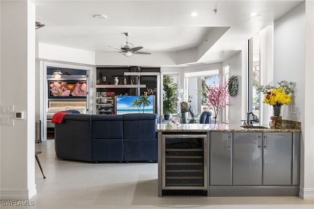 14270 Royal Harbour Ct Unit 323, Fort Myers, FL 33908 - living area featuring beverage cooler, a ceiling fan, bar with sink, recessed lighting, and light tile patterned floors