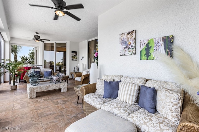 14270 Royal Harbour Ct Unit 323, Fort Myers, FL 33908 - living room with a ceiling fan, a textured ceiling, and a textured wall