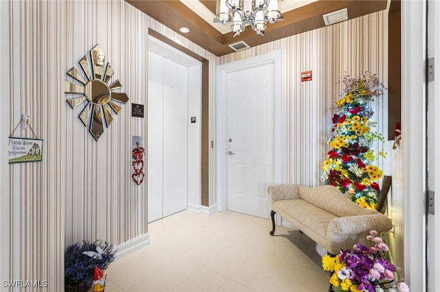 14270 Royal Harbour Ct Unit 323, Fort Myers, FL 33908 - entrance foyer featuring a chandelier and baseboards