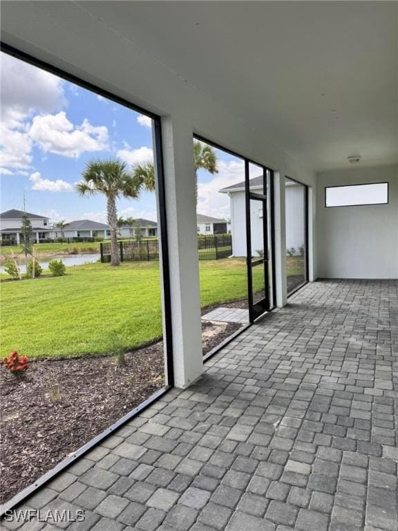 16325 Preservation Blvd, Punta Gorda, FL 33982 - unfurnished sunroom with a water view and a residential view