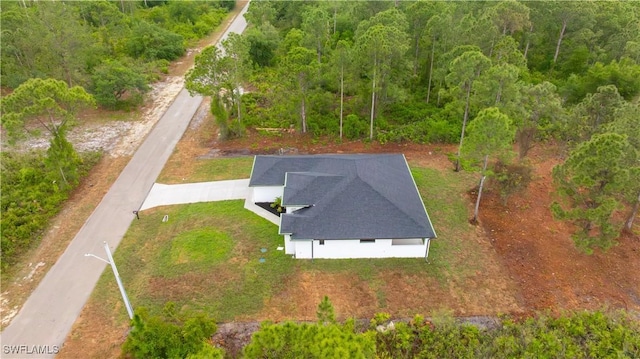 bird's eye view featuring a view of trees