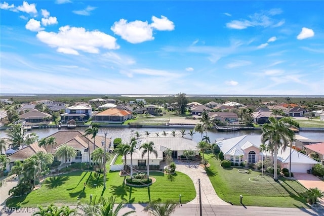 2556 SW 28th Pl, Cape Coral, FL 33914 - birds eye view of property with a water view and a residential view