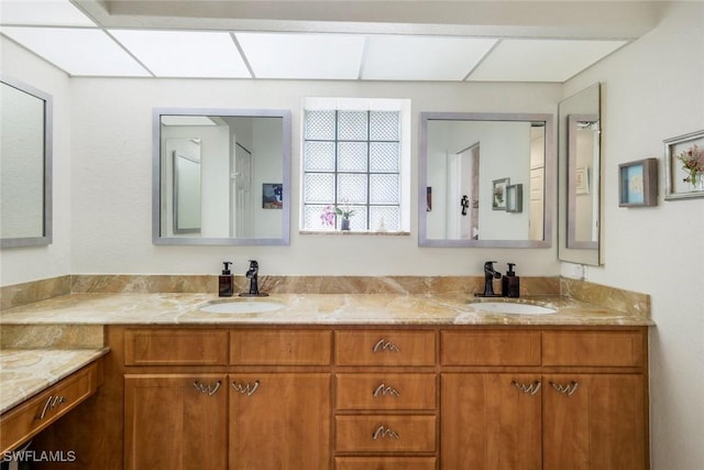 2556 SW 28th Pl, Cape Coral, FL 33914 - bathroom with double vanity and a sink