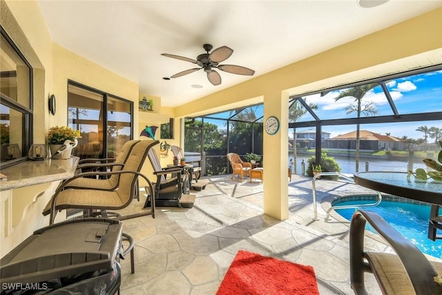2556 SW 28th Pl, Cape Coral, FL 33914 - sunroom / solarium with a water view, ceiling fan, and a swimming pool