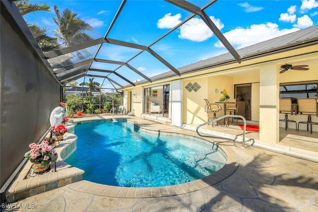 2556 SW 28th Pl, Cape Coral, FL 33914 - pool featuring a ceiling fan, glass enclosure, and a patio area